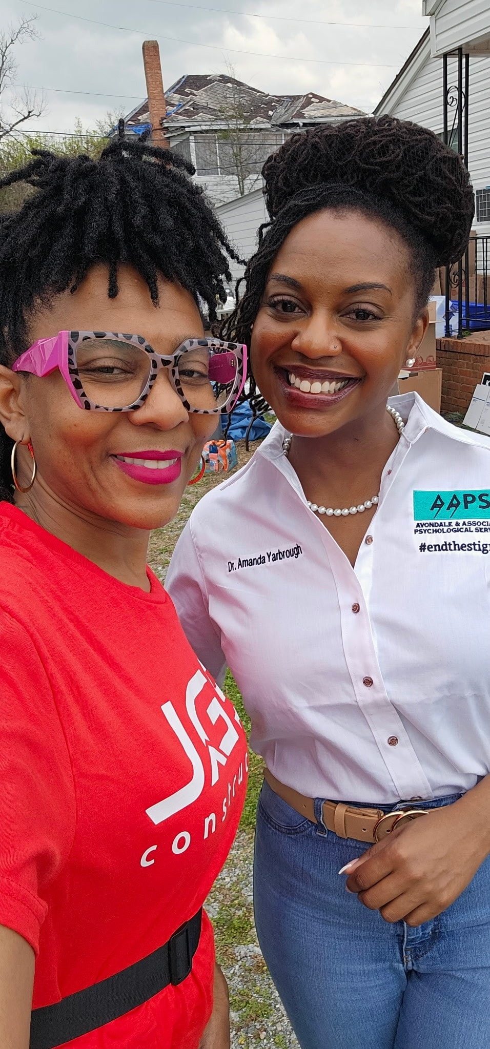 Dr. Amanda Yarbrough with community member at outdoor event